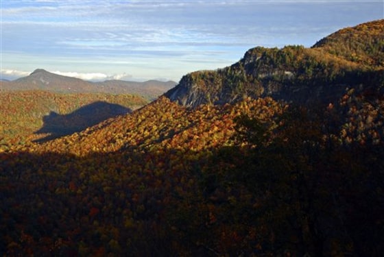 This photo taken on Oct. 24, 2009, at 5:55 p.m. local time and released by Jerry Jaynes for Jackson County Tourism Authority shows a shadow resembling a bear behind Whiteside Mountain in southern Jackson County near Cashiers, N.C.